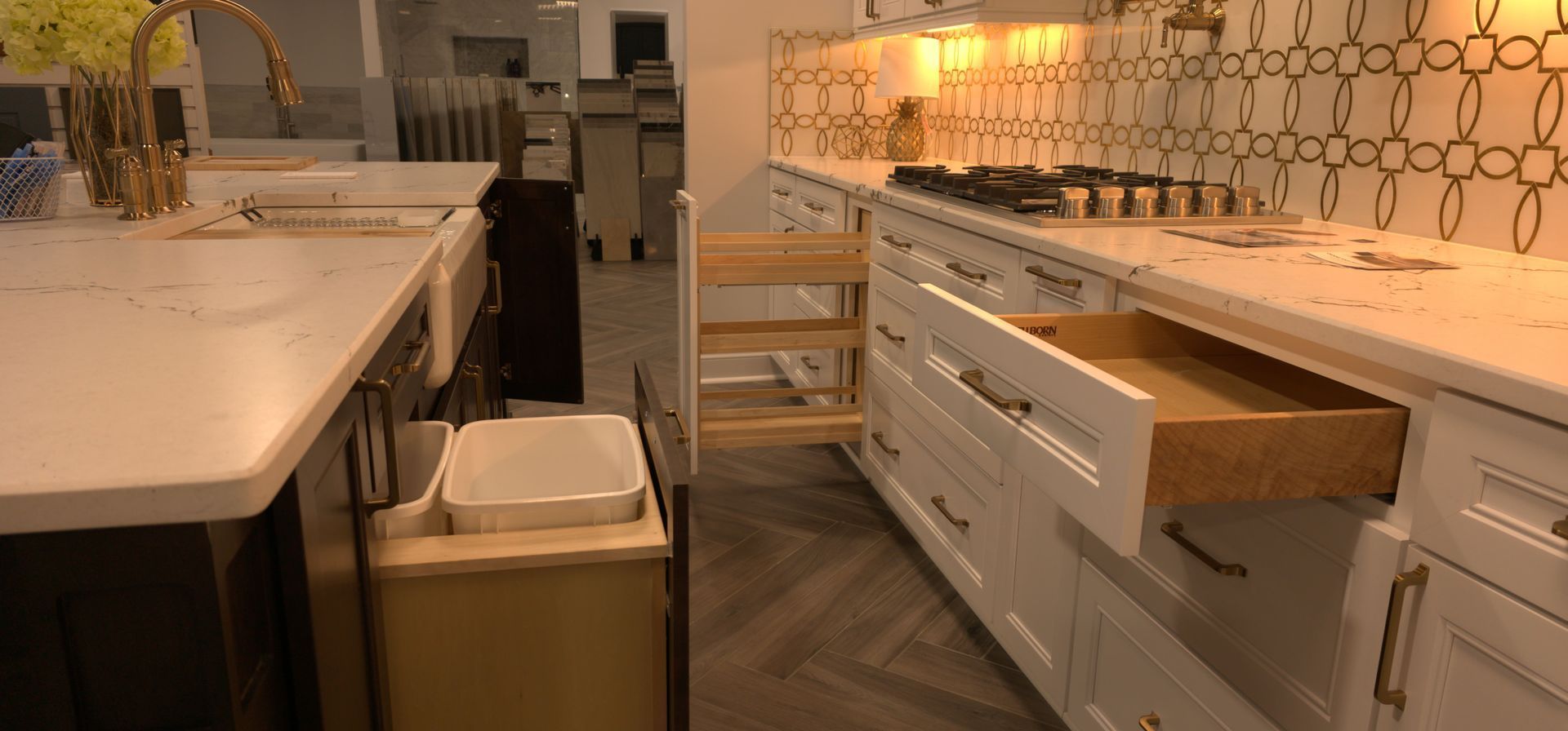 Cabinetry with pull-out drawers and storage inserts on display in the ProLux Remodeling showroom